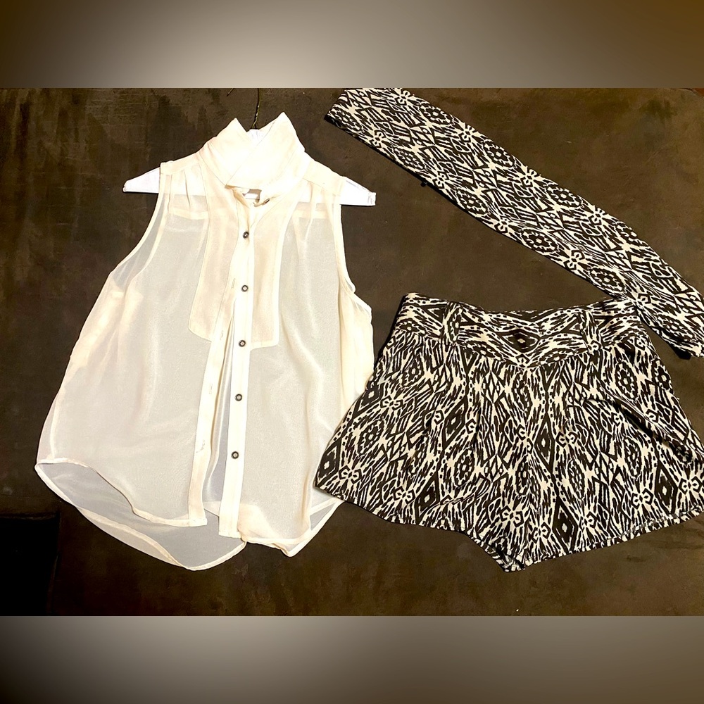 Cream sheer shirt with brown and cream culottes.